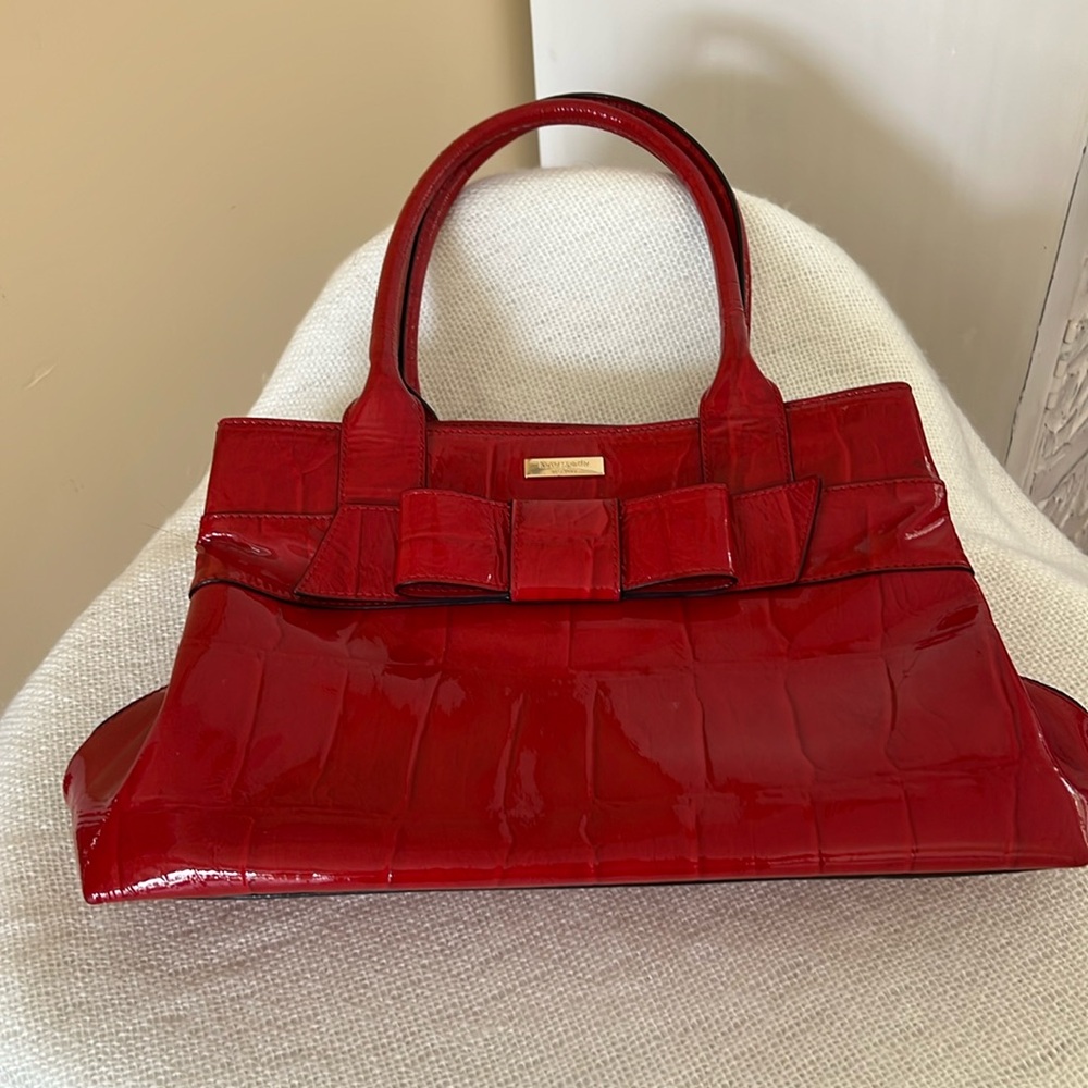 Kate Spade shiney red handbag.
